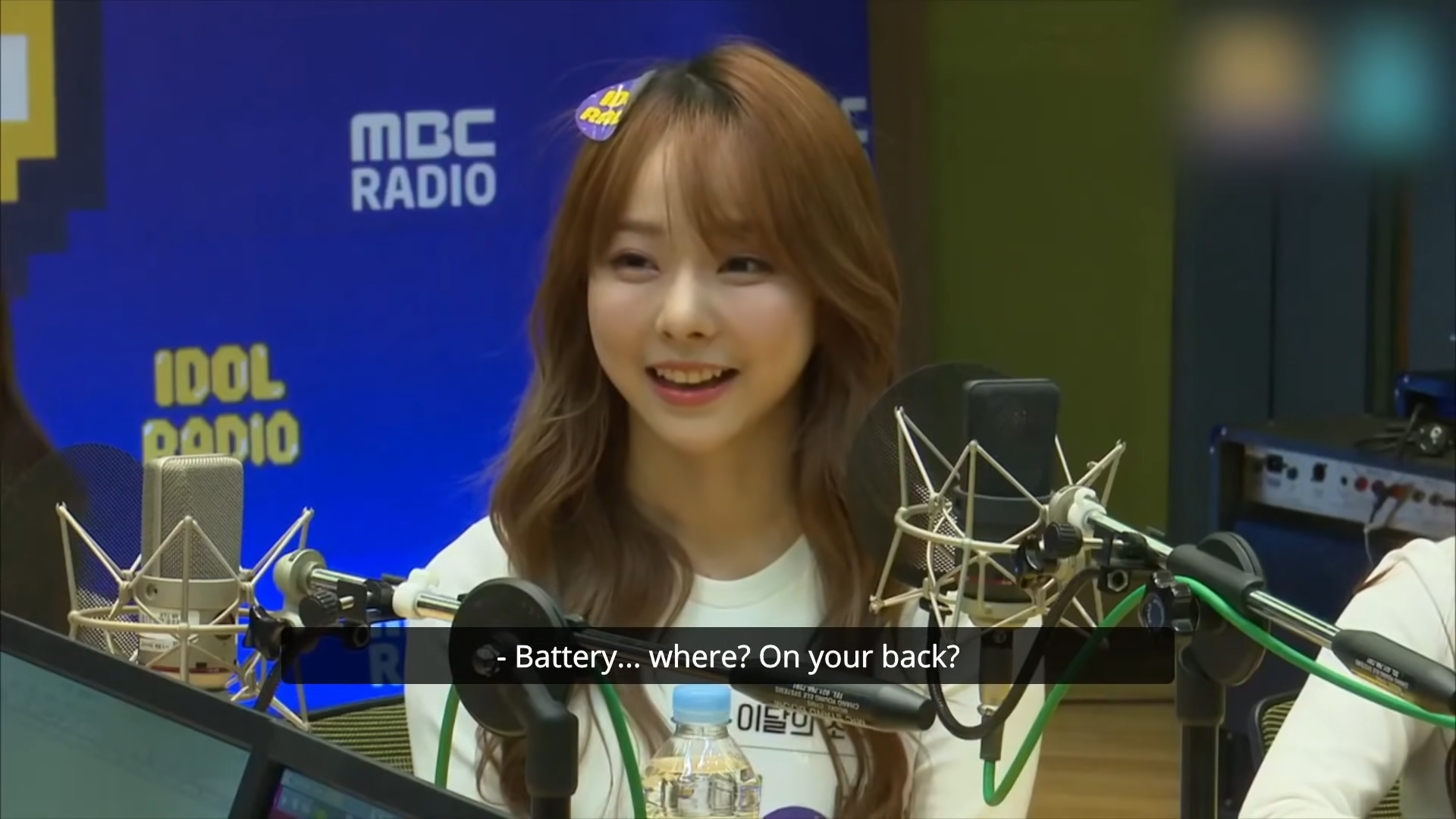 Vivi in an interview. The interviewer asks 'Battery... where? On your back?'